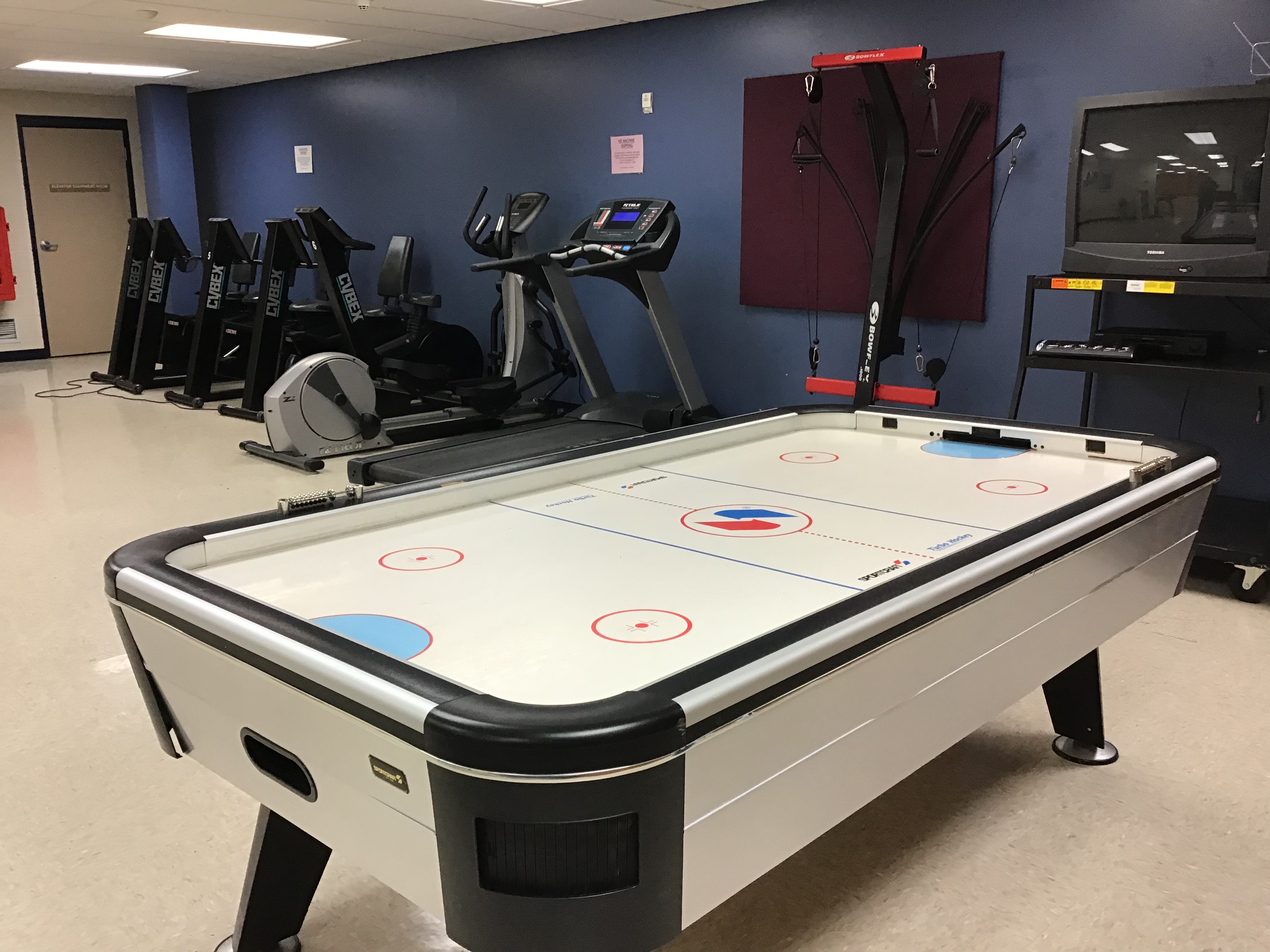 Recreation Room - Air Hockey & Exercise Equipment
